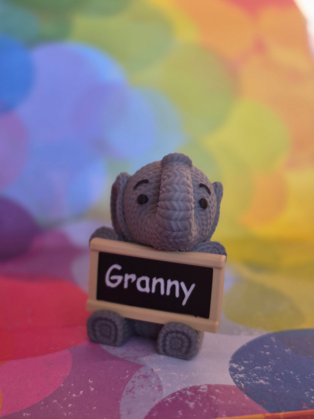 Faux Elephant holding sign!