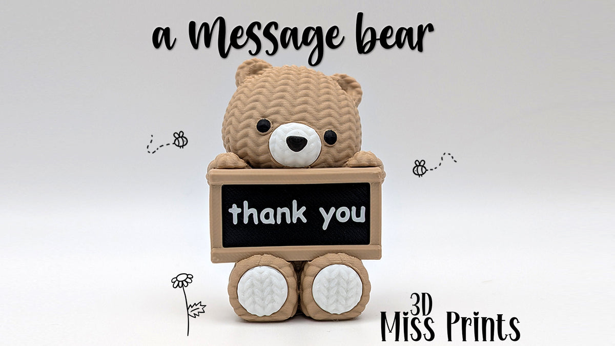 Faux knit bear with sign.